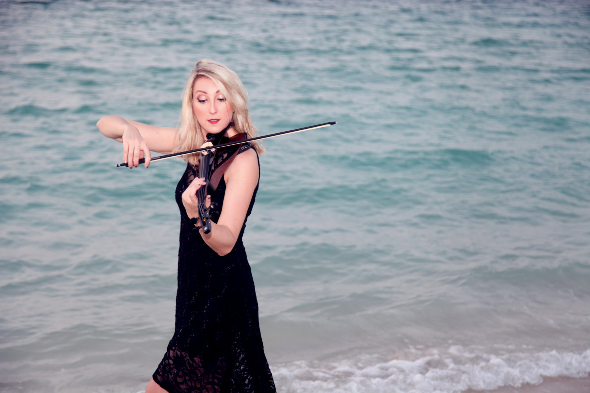 Classical Violin Player in Dubai on beach